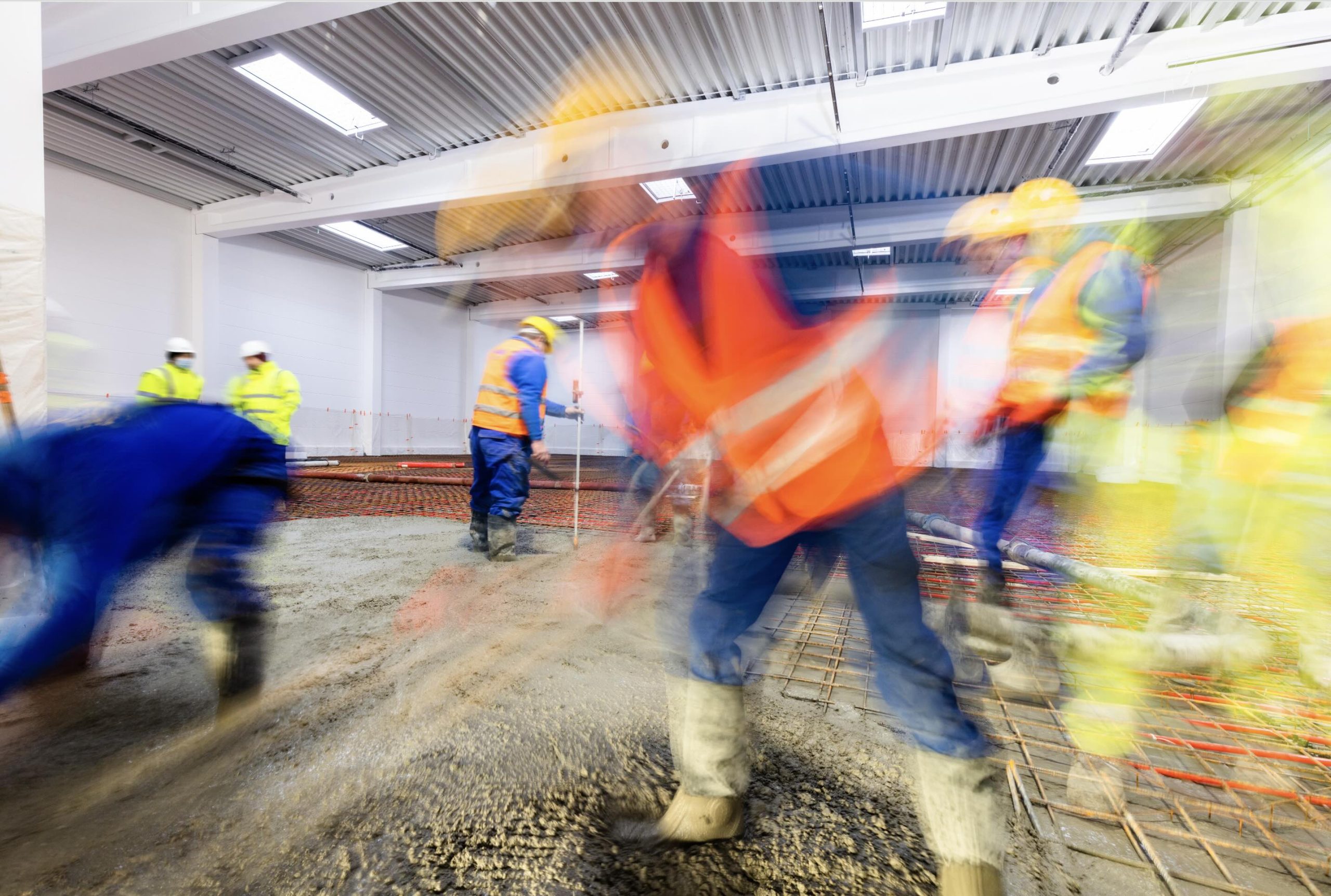 Construction workers pouring L1 Concrete